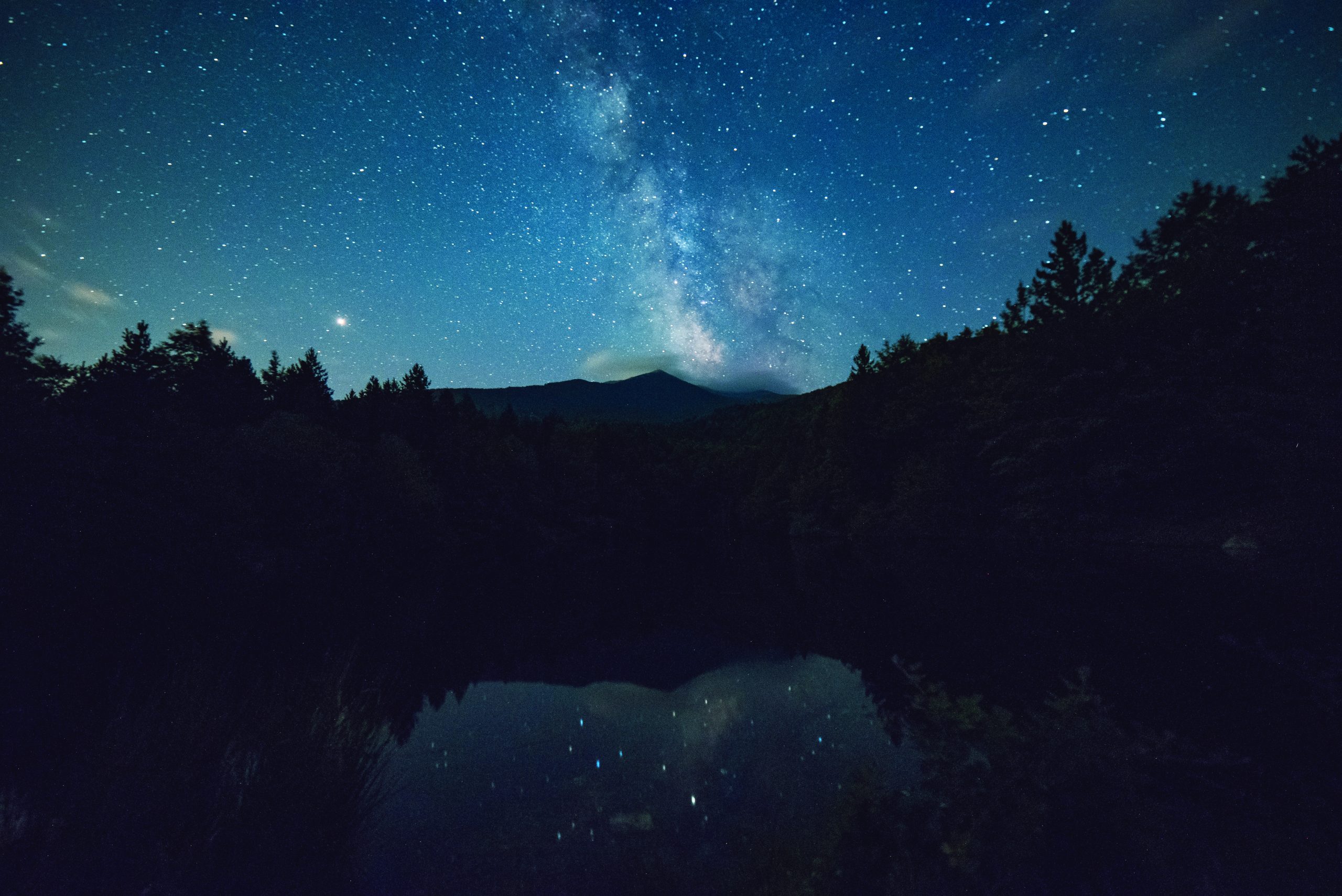 night sky with stars over mountains